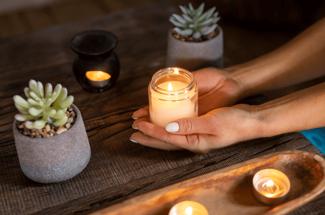 high angle woman holding candle